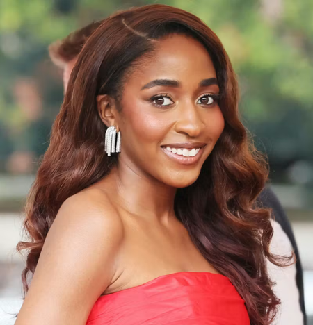 Ayo Edebiri chestnut brown wave hair